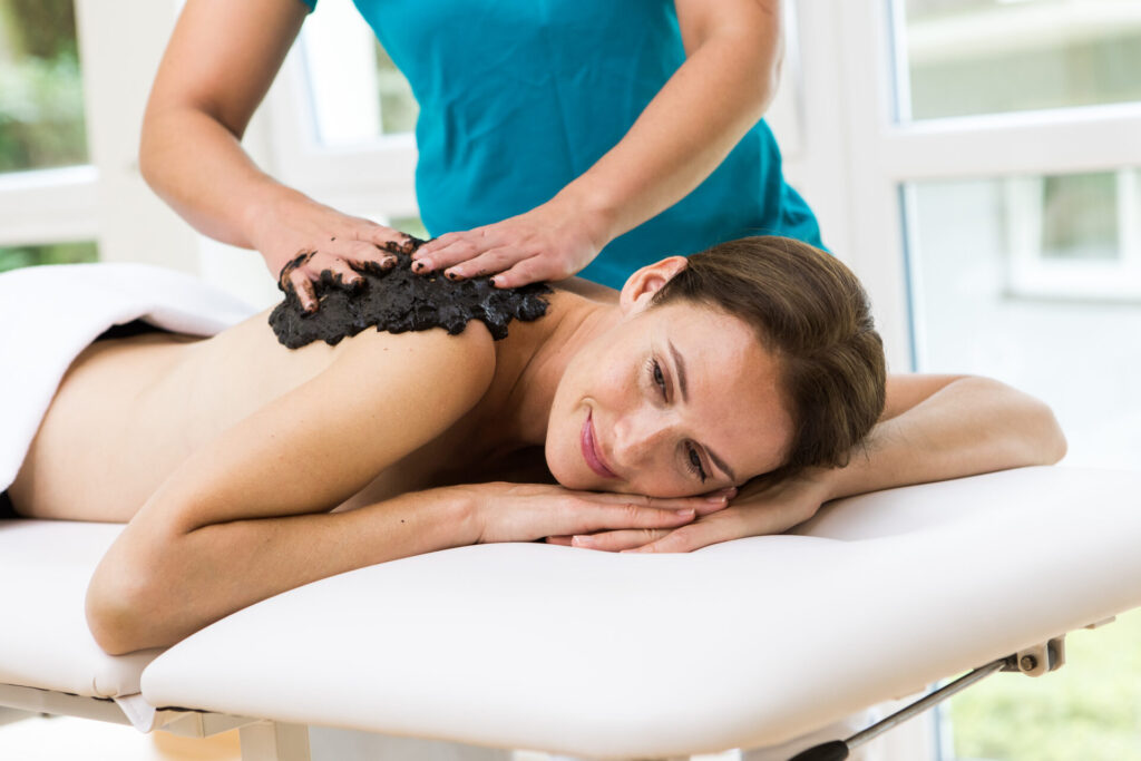 Moor Massage Massage mit Moorpackung